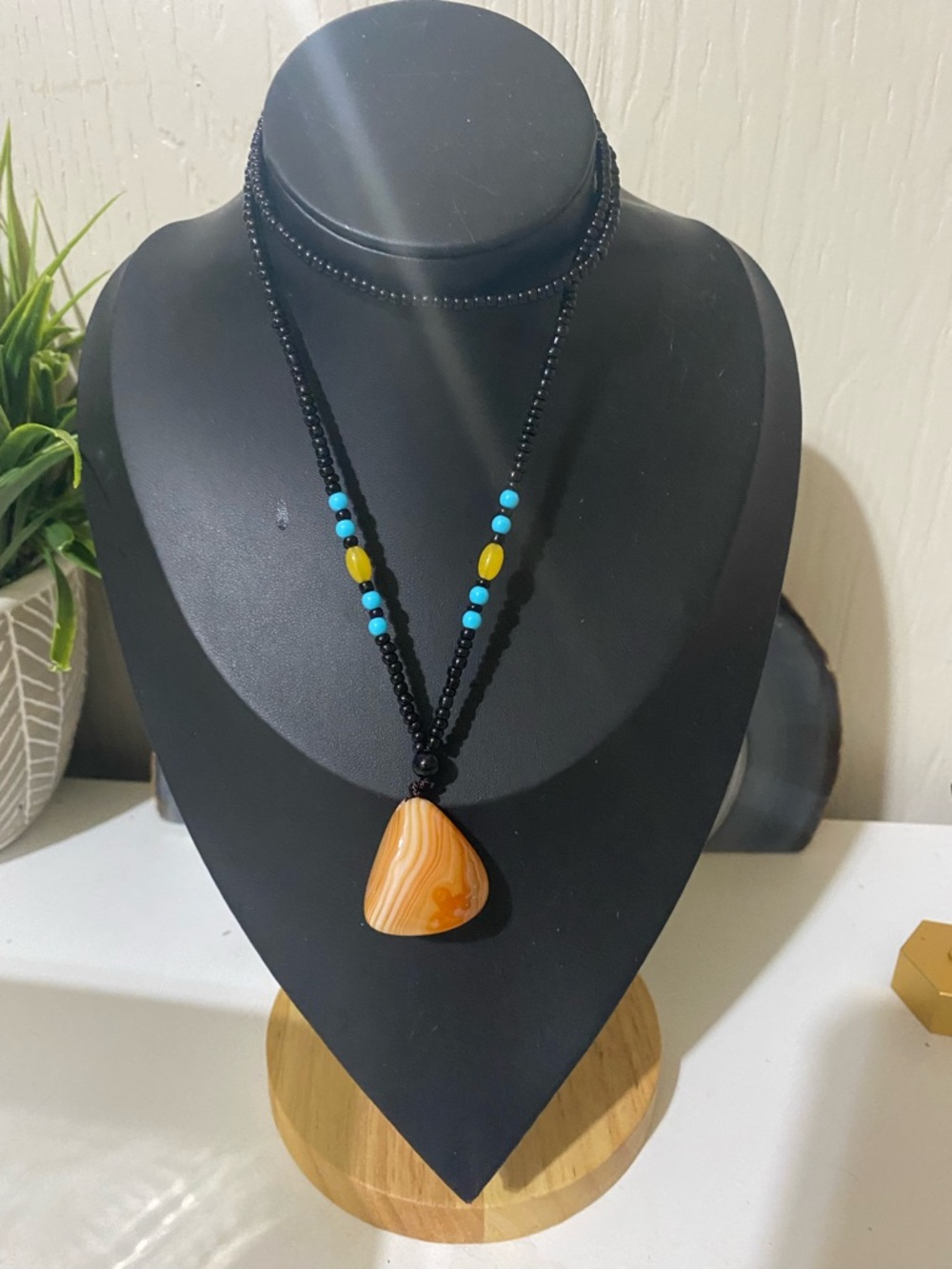 Black Beaded Necklace with Orange agate Pendant and Turquoise Accent Beads